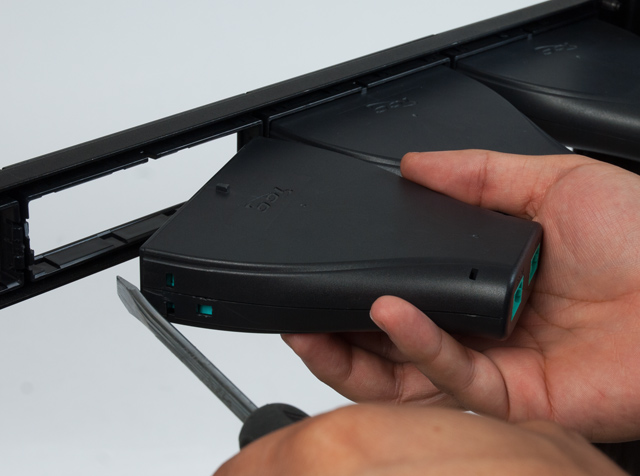 Easily remove plastic cassettes with flathead screwdriver