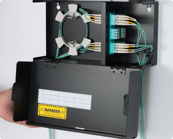 Fiber optic rack mount enclosure with Classic LGX compatible footprint