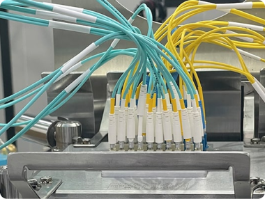 LC fiber optic patch cords being machine polished